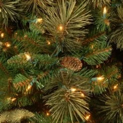 6.5 Ft. Pre-Lit Carolina Pine Slim Artificial Christmas Tree With Flocked Pine Cones, Clear Lights -Michaels Shop 28904 CAP3 330 65 2