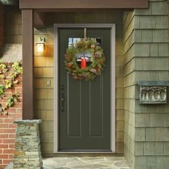 24" Feel Real® Bristle Berry Wreath With Red Electronic Candle, Red Berries & Cones -Michaels Shop D206627S 2