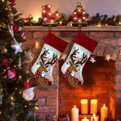 Glitzhome® 21" LED Reindeer Christmas Stockings, 2ct. -Michaels Shop D252853S 2
