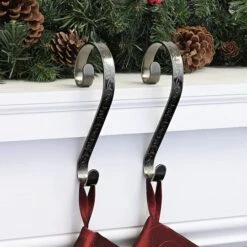 Haute Decor Stocking Scroll® Holly Embossed Antique Brass Stocking Holders, 2ct. -Michaels Shop D349631S 2