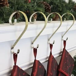 Haute Decor Stocking Scroll® Gold Glitter Stocking Holders, 4ct. 7 Haute Decor Stocking Scroll® Gold Glitter Stocking Holders, 4ct. -Michaels Shop D349651S 2