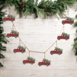 Glitzhome® 6ft. Christmas Red Truck Garland, 2ct. 11 Glitzhome® 6ft. Christmas Red Truck Garland, 2ct. -Michaels Shop D445235S 2