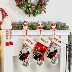 Glitzhome® 7" Santa, Snowman & Penguin Stocking Holder Set -Michaels Shop D479500S 3