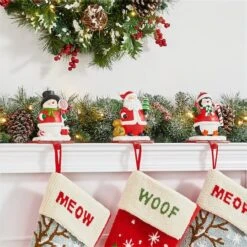 Glitzhome® 7" Santa, Snowman & Penguin Stocking Holder Set -Michaels Shop D479500S 4