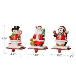 Glitzhome® 7" Santa, Snowman & Penguin Stocking Holder Set -Michaels Shop D479500S 5