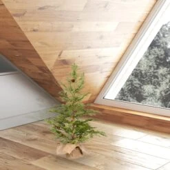 24" Unlit Cedar Pine Artificial Christmas Tree In Burlap Base 8 24" Unlit Cedar Pine Artificial Christmas Tree In Burlap Base -Michaels Shop D522600S 2