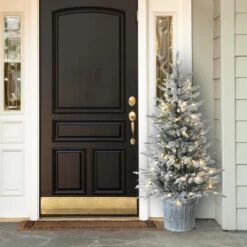 4.5ft. Pre-Lit Flocked Alpine Fir Entrance Tree In Gray Pot, Clear LED Lights 10 4.5ft. Pre-Lit Flocked Alpine Fir Entrance Tree In Gray Pot, Clear LED Lights -Michaels Shop D531427S 2