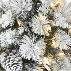 22" Pre-Lit Flocked Chiwawa Basin Pine Tree With Pinecones In Gray Pot, Clear LED Lights 13 22" Pre-Lit Flocked Chiwawa Basin Pine Tree With Pinecones In Gray Pot, Clear LED Lights -Michaels Shop D531431S 4