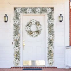 Glitzhome® 24" Pre-Lit Snow Flocked Greenery Pine Poinsettia Christmas Wreath -Michaels Shop D652255S 3