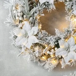 Glitzhome® 24" Pre-Lit Snow Flocked Greenery Pine Poinsettia Christmas Wreath -Michaels Shop D652255S 4