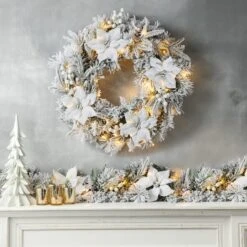 Glitzhome® 24" Pre-Lit Snow Flocked Greenery Pine Poinsettia Christmas Wreath & Matched 2 Pack 9ft. Garland Set -Michaels Shop D652258S 3
