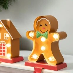 Glitzhome® Marquee LED Gingerbread House & Gingerbread Man Christmas Stocking Holder Set -Michaels Shop D652344S 5