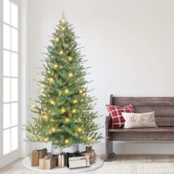 7.5ft. Pre-Lit Potted Artificial Christmas Tree, Clear Incandescent Lights 11 7.5ft. Pre-Lit Potted Artificial Christmas Tree, Clear Incandescent Lights -Michaels Shop D659697S 4