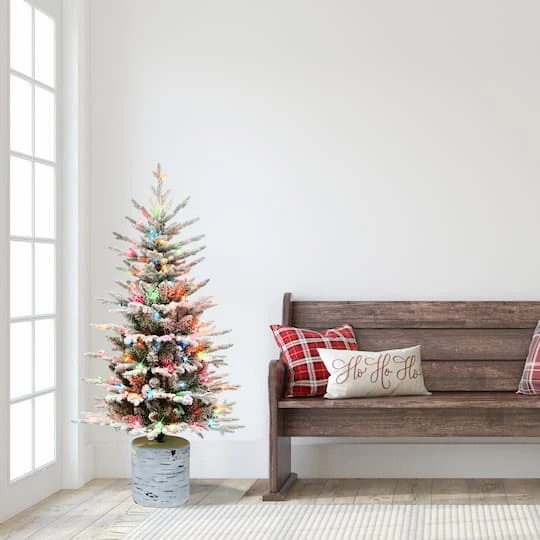 4.5ft. Pre-Lit Flocked Arctic Fir Artificial Christmas Tree, Multicolor Lights 6 4.5ft. Pre-Lit Flocked Arctic Fir Artificial Christmas Tree, Multicolor Lights - Image 4