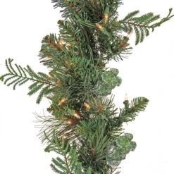 First Traditions™ Collection 9ft. Pre-Lit Artificial North Conway Garland With Glittery Cones & Eucalyptus, 100 Clear Lights -Michaels Shop D675898S 3
